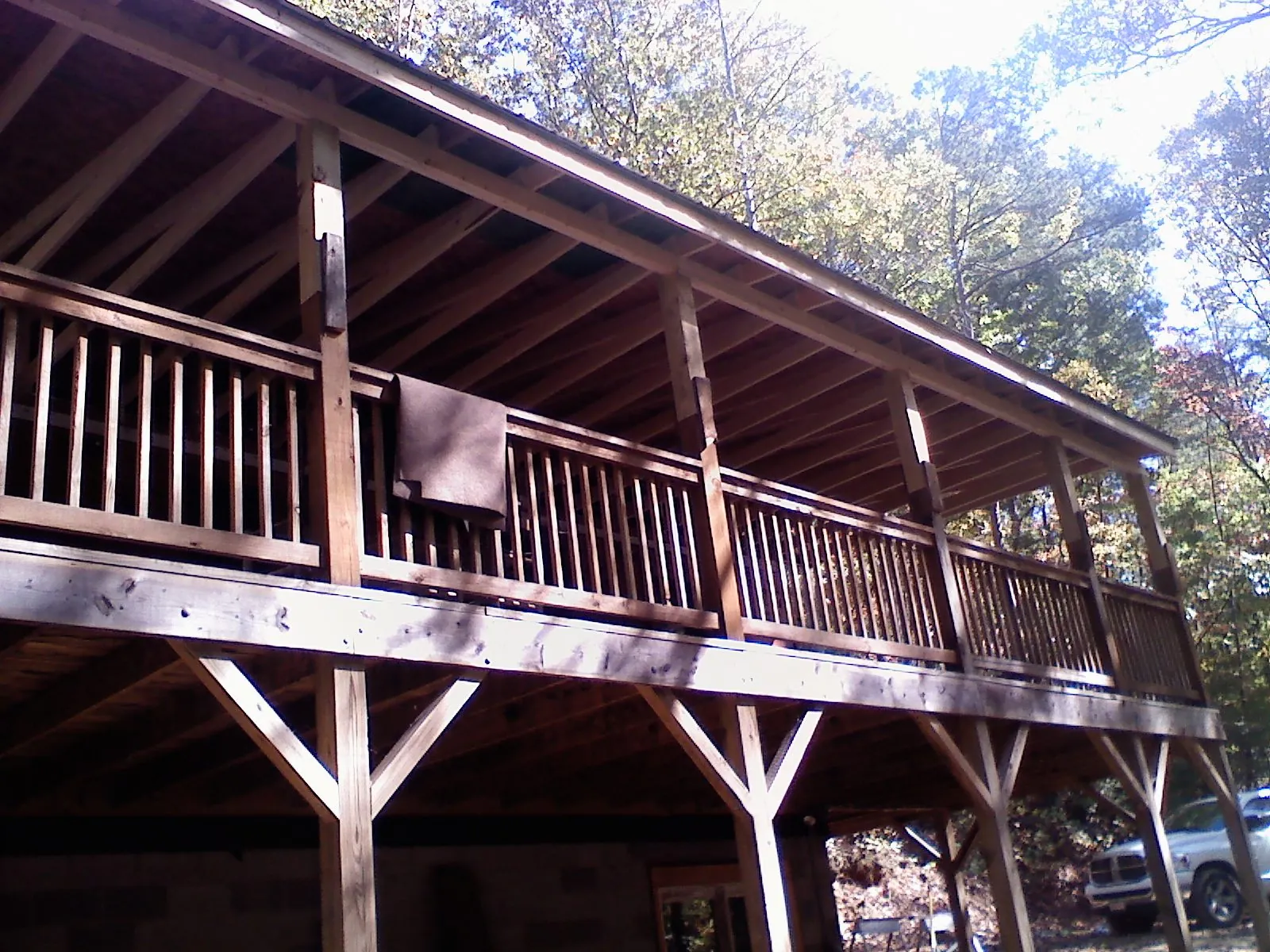 Timber framing under a new elevated porch and deck — Roof Leak Repair in Kingston by Roofing Brothers